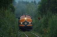 Bild: Tågabs godståg 48108 Kristinehamn-Hällefors i Storfors den 3 september 2004. Loket är TMY 106. Foto Roy Mårtensson.