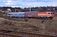 Bild: Rc2 1046 med tåg vid Storvik 1993