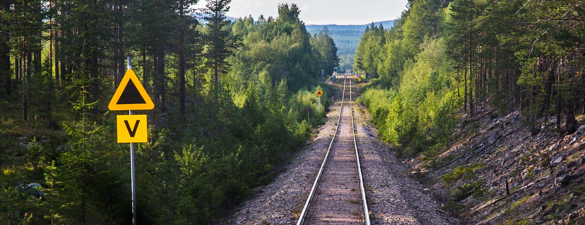 Tavla för vägkorsning på Inlandsbanan